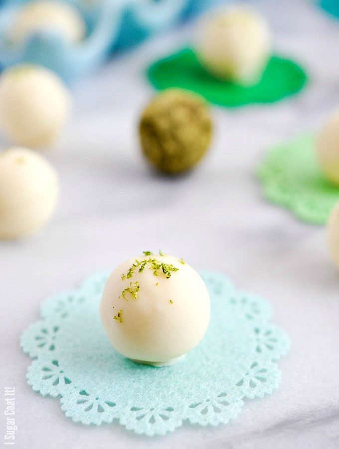 White Chocolate Mojito Truffles are delicate white chocolate shells filled with a luxuriously smooth ganache with fresh lime, mint and a touch of vodka.