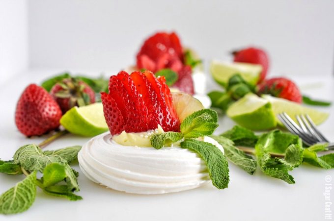 The perfect warm weather dessert, these Key Lime Meringue Nests are vanilla meringues filled with decadent white chocolate key lime ganache and fresh fruit.