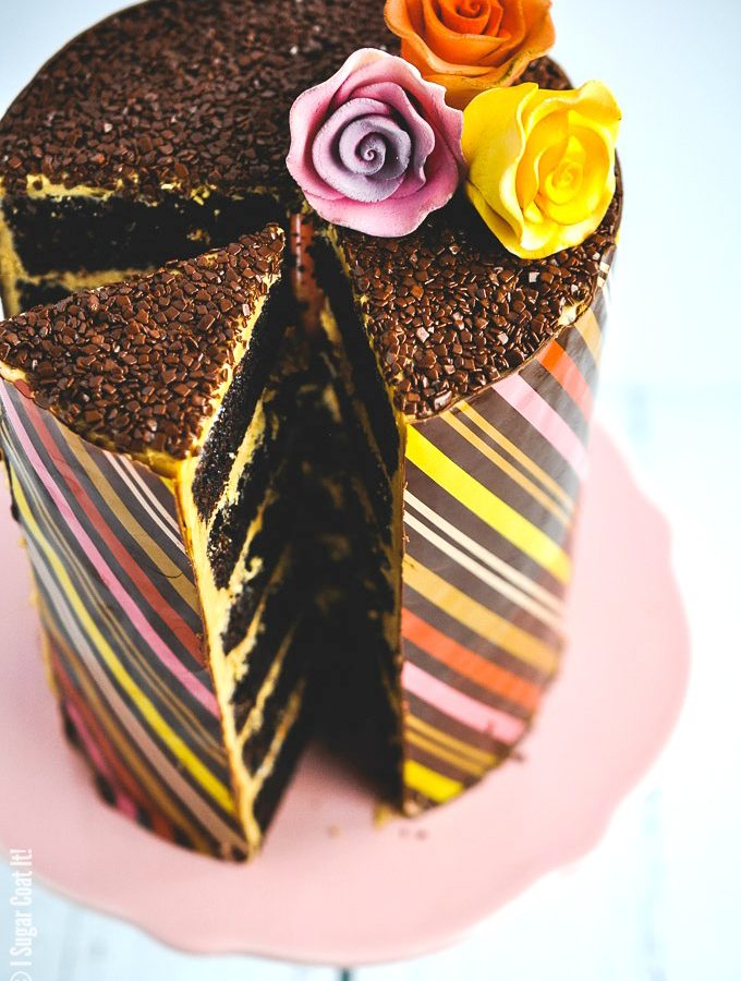 Whipped Dulcey Ganache Chocolate Wrapped Cake is six layers of pure decadence.
