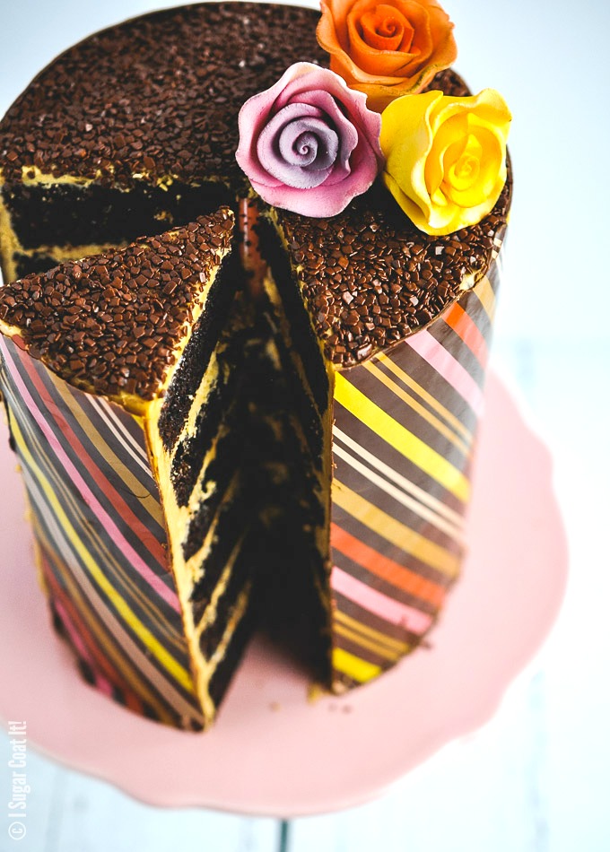 Whipped Dulcey Ganache Chocolate Wrapped Cake is six layers of pure decadence.