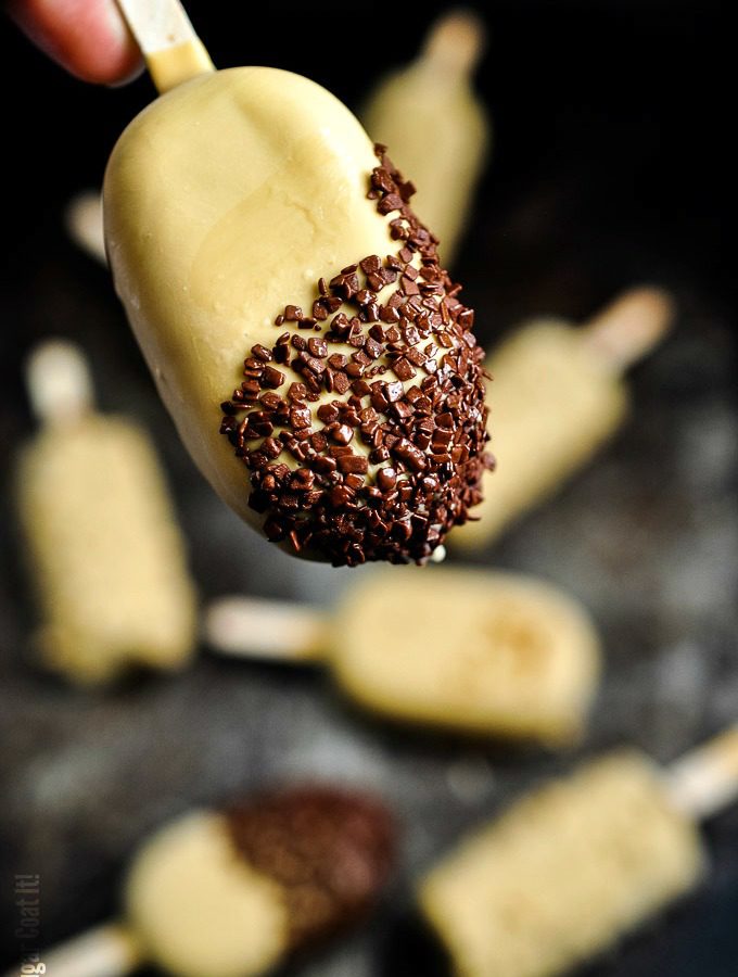 Hazelnut Milk Triple Chocolate Popsicles are a decadent blend of hazelnut milk, cocoa, dark and blond chocolate, dipped in praline and chocolate flakes.