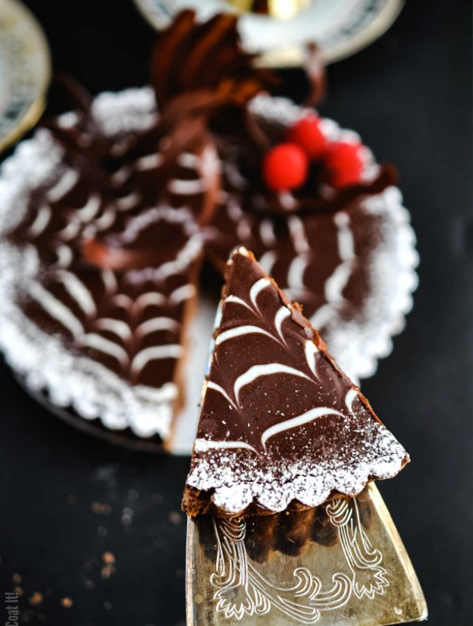 Triple Chocolate Ganache Tart. Chocolate pâte sucrée filled with layers of milk and dark chocolate ganache for a simple and truly decadent treat.