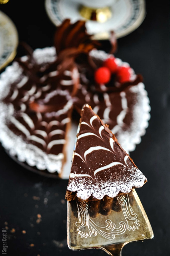 Triple Chocolate Ganache Tart. Chocolate pâte sucrée filled with layers of milk and dark chocolate ganache for a simple and truly decadent treat.