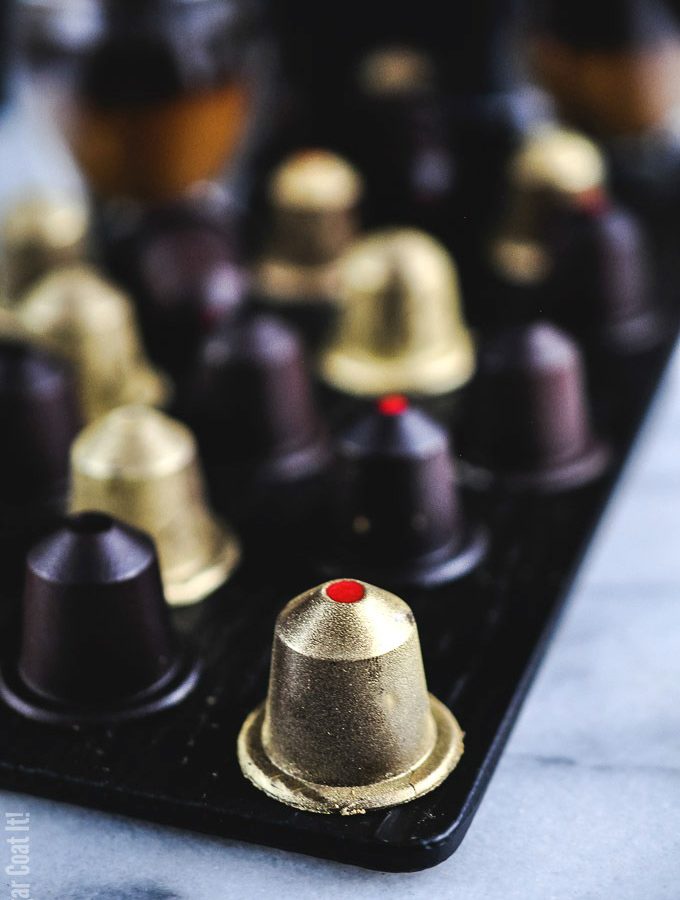 A coffee lover's dream, these dark chocolate nespresso-like pods are filled with a luxurious white chocolate espresso caramelized cacao nib ganache.