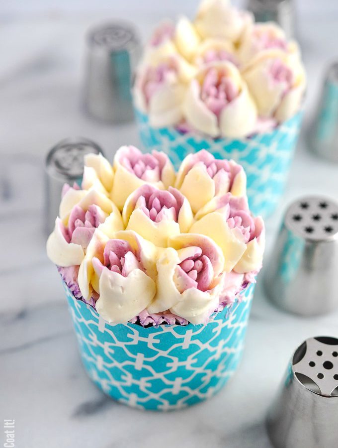 Blueberry Lemon Cupcakes topped with decadent blueberry lemon buttercream flowers, deliver fresh, tangy sweetness in every bite!