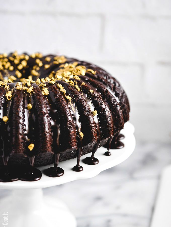 Coffee Chocolate Truffle Bundt Cake is decadent dark chocolate cake, dripping with coffee ganache and topped with golden cacao nibs for a little bling and crunch.