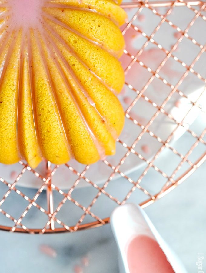 This Blood Orange Bundt Cake is a melt-in-your-mouth citrus experience, with a pretty pink citrus drizzle on top! I Sugar Coat It