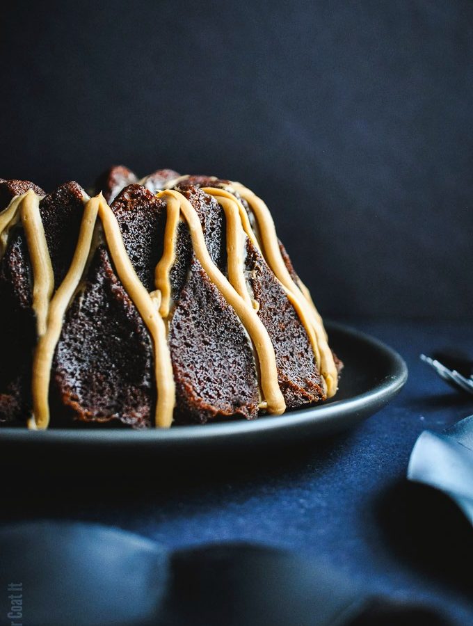 Deeply spiced, decadently rich Chinese Five-Spice Bundt Cake sweetened with molasses and date sugar and topped with a silky blond chocolate.