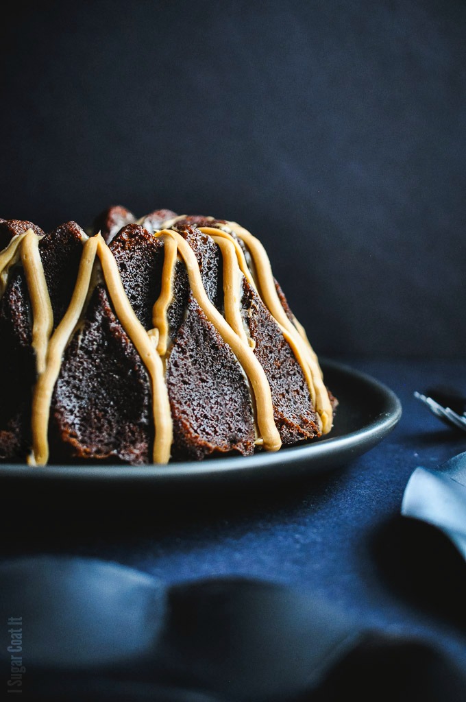 Deeply spiced, decadently rich Chinese Five-Spice Bundt Cake sweetened with molasses and date sugar and topped with a silky blond chocolate.