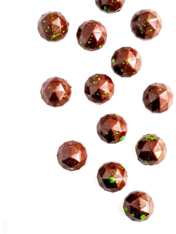 Yuzu Caramel Bonbons are bite-sized, silky, sweet, tart and delightfully aromatic citrus caramel wrapped in dark chocolate.