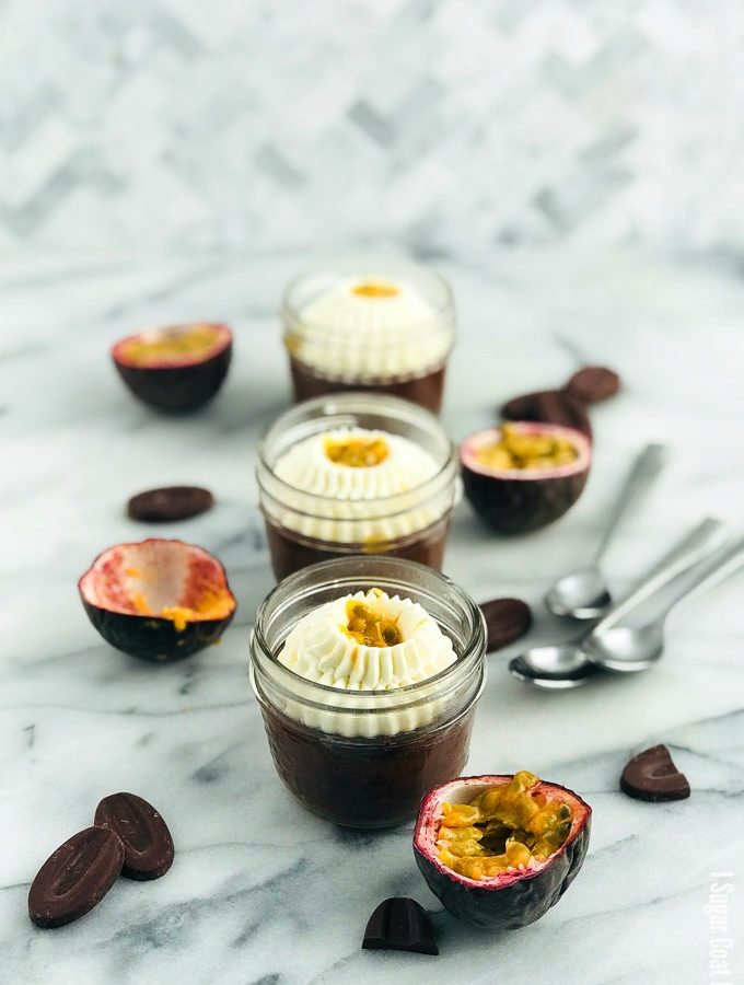 Decadent, 3-ingredient, single serve Sous Vide Flourless Chocolate Cake made with passion fruit infused dark chocolate topped with whipped coconut cream.