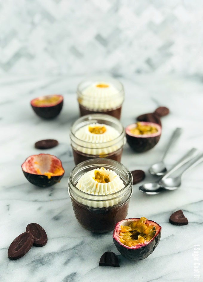 Decadent, 3-ingredient, single serve Sous Vide Flourless Chocolate Cake made with passion fruit infused dark chocolate topped with whipped coconut cream.