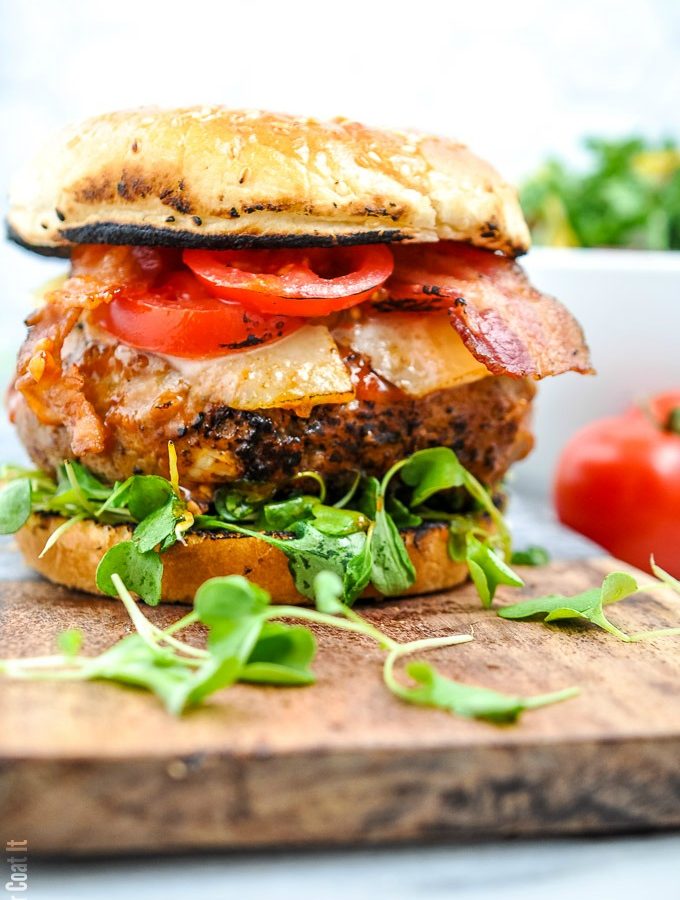 homemade burger topped with bacon, tomato and microgreens | i sugar coat it