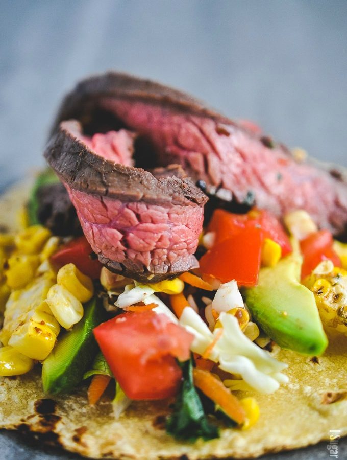 Add this beefy, juicy, melt-in-your-mouth, flavourful Sous Vide Flank Steak Tacos with all the fixings to your next taco any day.