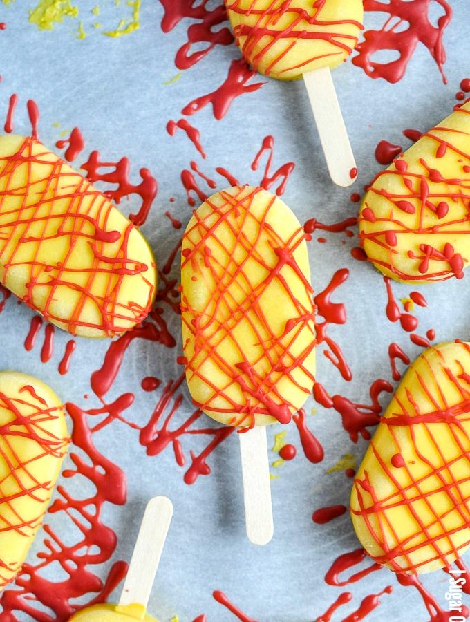 Refreshingly creamy, flavourful, Asian-inspired Sous Vide Mango Basil Ice Pops with strawberry drizzle to lick your summer into gear.