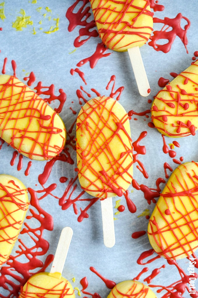 Refreshingly creamy, flavourful, Asian-inspired Sous Vide Mango Basil Ice Pops with strawberry drizzle to lick your summer into gear.